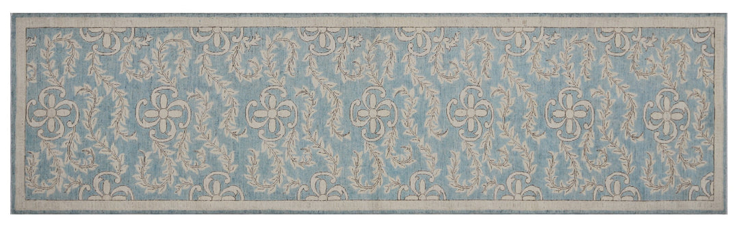 Authentic hand-knotted Afghan runner rug from Ariana Rugs, featuring an intricate floral design in blue and beige organic wool.