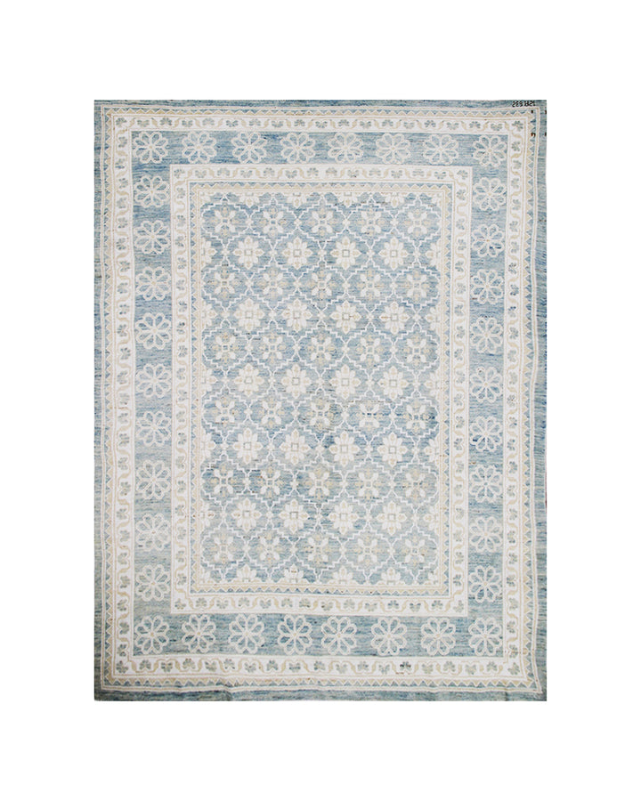 Authentic hand-knotted Afghan area rug from the Ariana Samarkand Collection, featuring a classic geometric design in blue and ivory organic wool.
