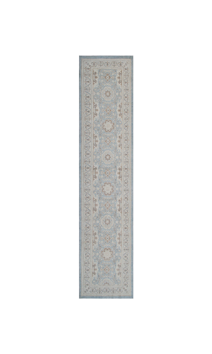 Authentic fine hand-knotted Afghan runner rug from the Ariana Traditional Collection, featuring the Agra 505 Blue design in low-pile blue, ivory, and brown organic wool.