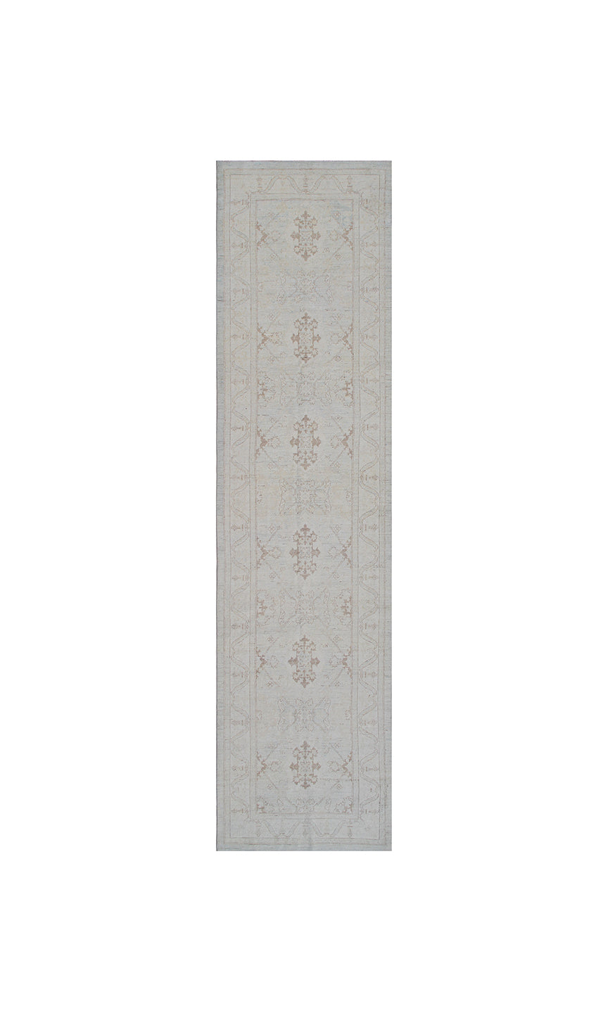 Authentic hand-knotted Afghan runner rug from the Ariana Transitional Collection, featuring the Agra 505 design in low-pile soft blue organic wool.