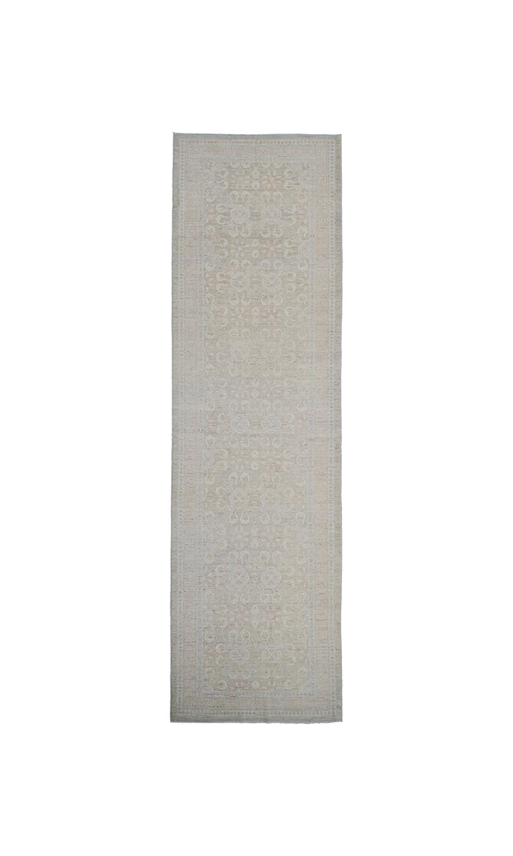 Authentic hand-knotted Afghan runner rug from the Ariana Transitional Collection, featuring a vintage floral design in washed-out olive green organic wool.