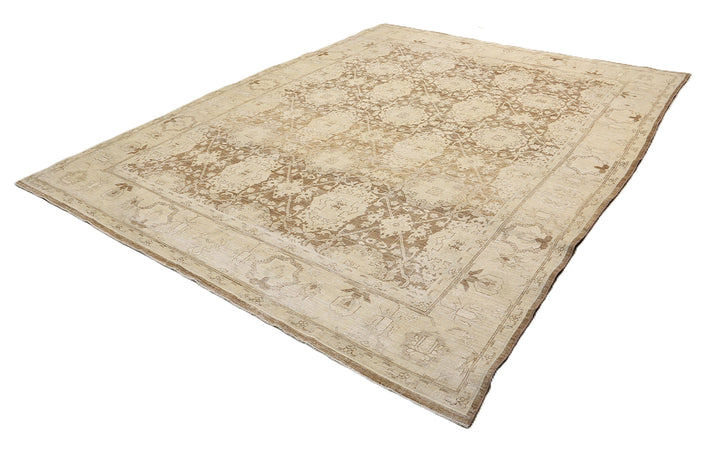 One-of-a-kind hand-knotted organic wool rug in Agra 505 design, featuring muted brown earthtone colors from the Ariana Vintage Traditional Collection.
