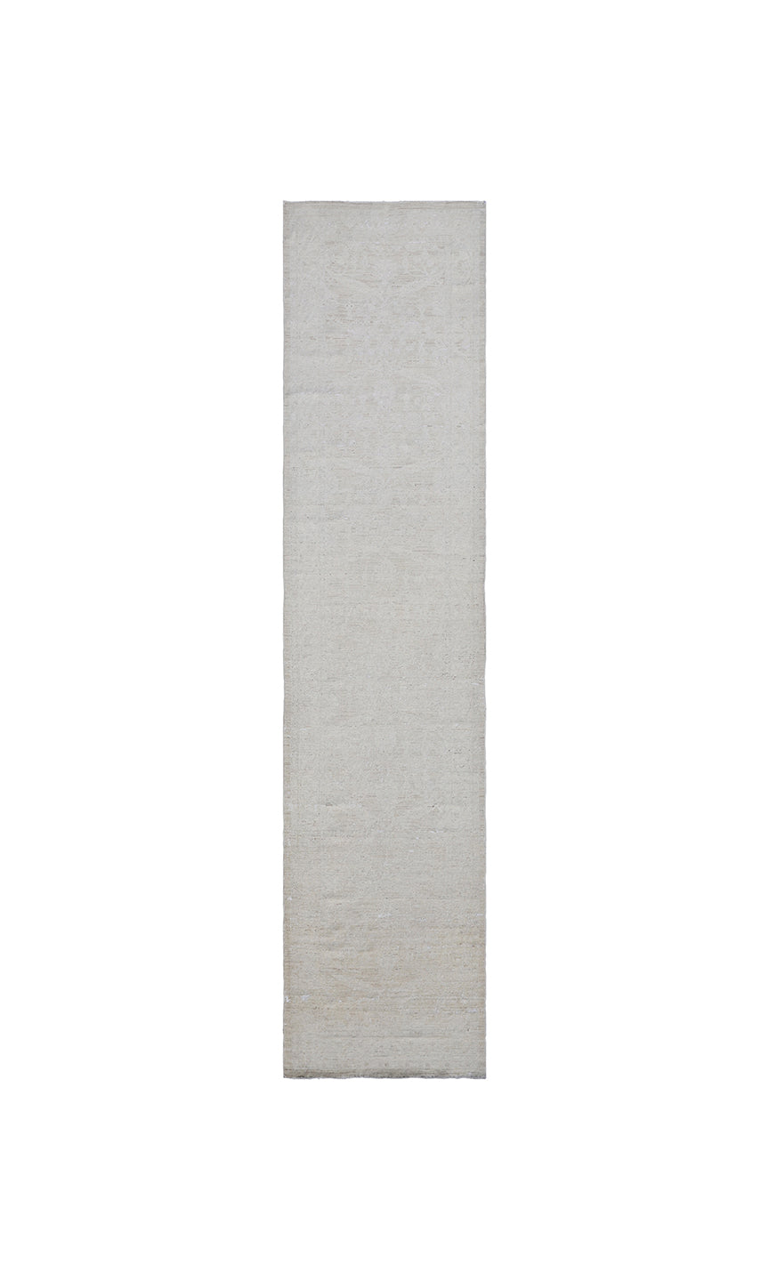 Authentic hand-knotted Afghan runner rug from the Ariana Vintage Collection, featuring a brand-new, beautifully distressed geometric design in pale, muted organic wool tones.