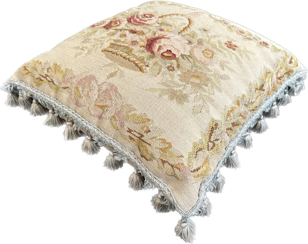 Handmade 19x19 cream wool and cotton Aubusson pillowcase with white tassels featuring a flower basket by Ariana Rugs West Hollywood