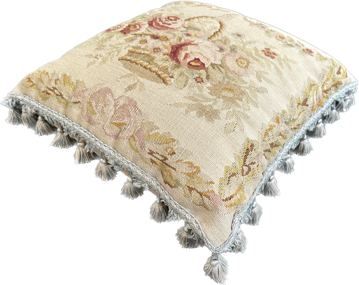 Handmade 19x19 cream wool and cotton Aubusson pillowcase with white tassels featuring a flower basket by Ariana Rugs West Hollywood
