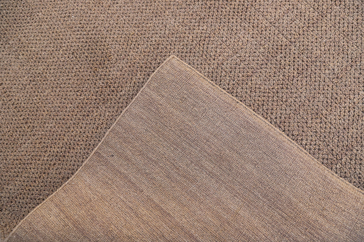 Large 10x14 brown hand-loomed wool area rug from the Diamond Collection with a textured loop pile.