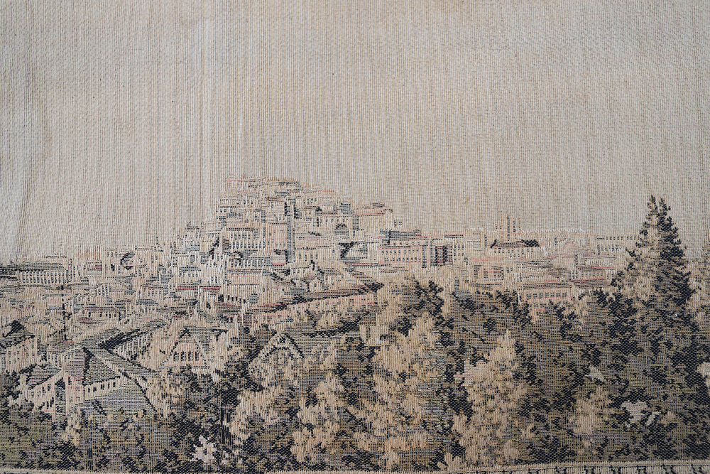 Early 20th-century power-loomed French tapestry featuring a scenic coastal city landscape, measuring 2 feet by 5 feet