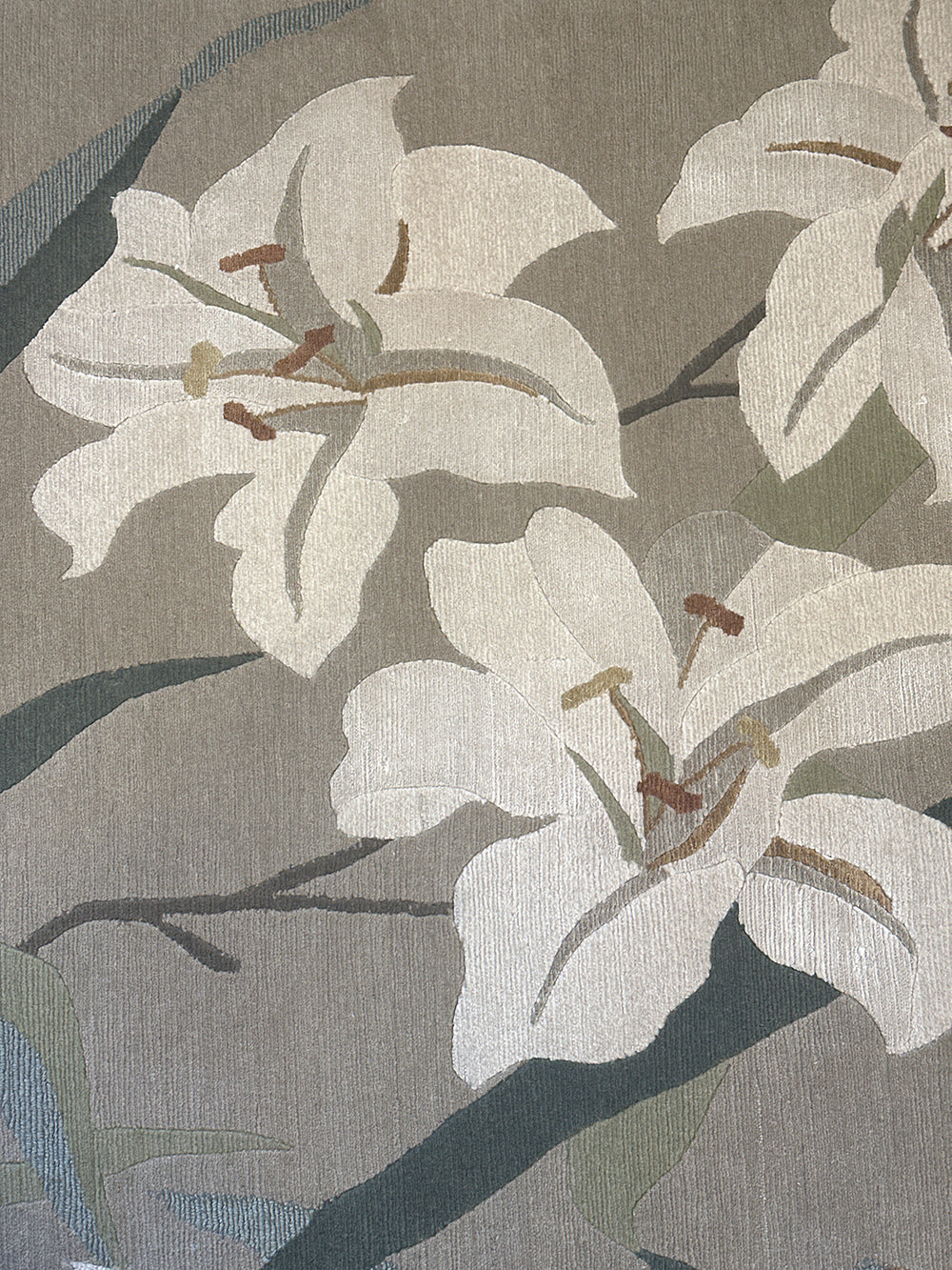 One-of-a-kind 6x9 hand-knotted Tibetan wool and silk rug with a green background and white floral design.