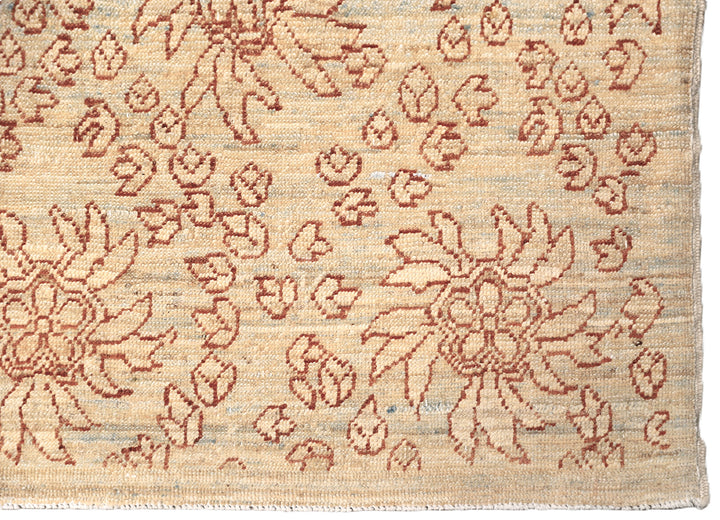 8'x10' Ariana Transitional Collection icy blue and terra cotta borderless floral wool area rug styled in a modern living room