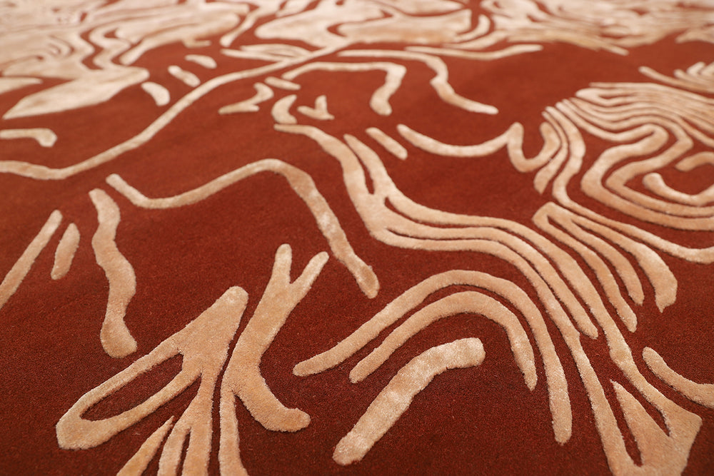 Luxury hand-tufted wool and silk rug named Ink, featuring an organic sculptural shape designed by Gulla Jónsdóttir for the Sandbourne Hotel in Santa Monica, produced by Ariana Rugs.