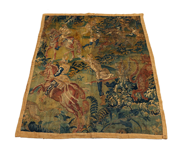 Vintage tapestry with historical scene of a warrior on horseback and animals, displayed flat.