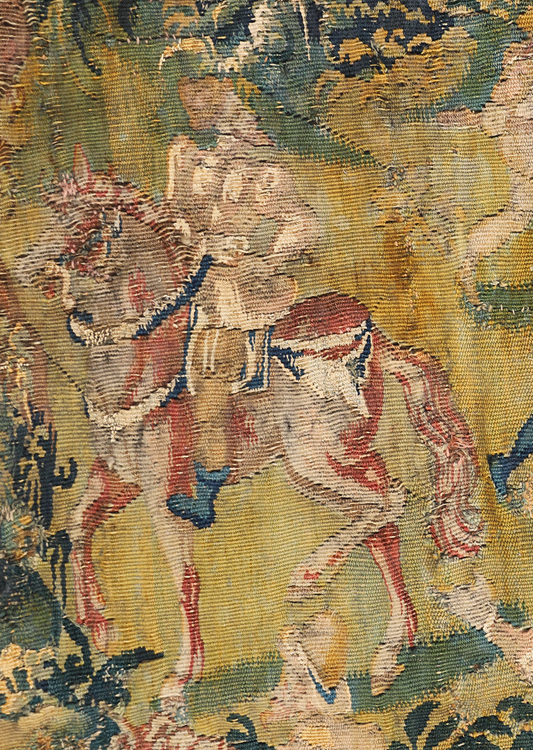 Close-up of a tapestry with a horse in a natural setting