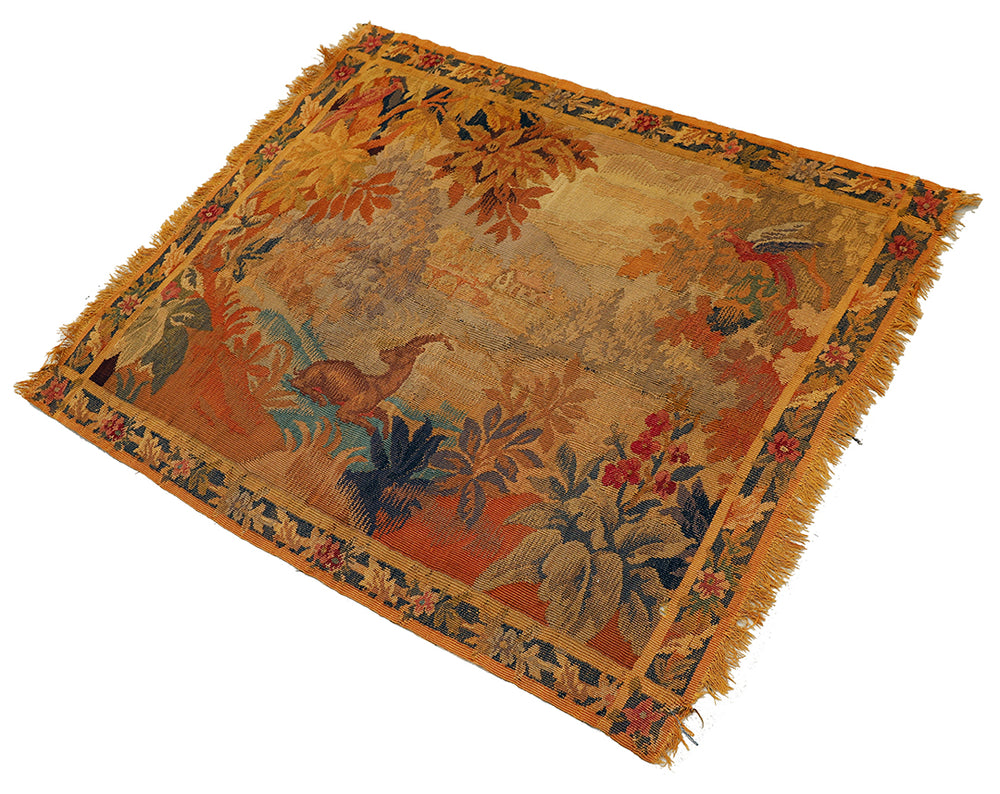 Decorative rug with nature-themed design on a white background