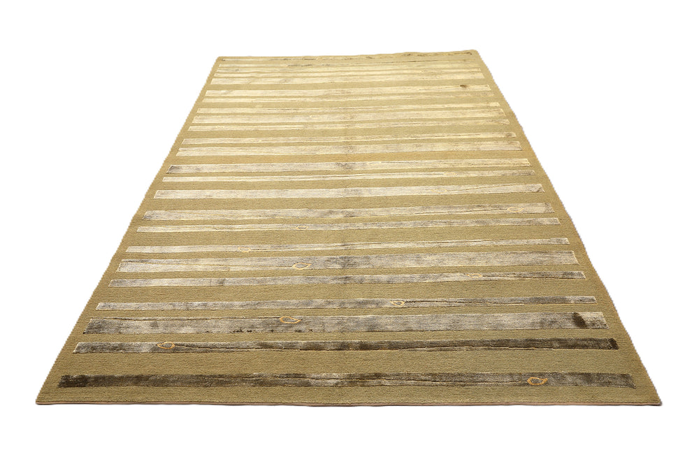 Hand-knotted Modern Tibetan Ariana rug in wool and silk featuring a geometric pattern in gold and greenish hues