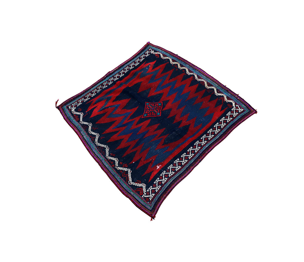 Authentic 4'x4' square Persian Rukursi Sofreh Kilim tribal rug with a hand-woven wool chevron pattern and textured flatweave pile details.