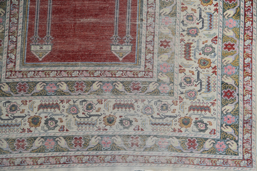 5'9" x 4'3" Rare Antique Ghiordes Western Anatolian Turkish Wool Prayer Rug with Mihrab Niche Design in Crimson Red, Ivory, Soft Pink, and Sage Green by Ariana Rugs West Hollywood