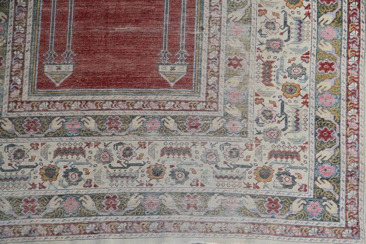 5'9" x 4'3" Rare Antique Ghiordes Western Anatolian Turkish Wool Prayer Rug with Mihrab Niche Design in Crimson Red, Ivory, Soft Pink, and Sage Green by Ariana Rugs West Hollywood