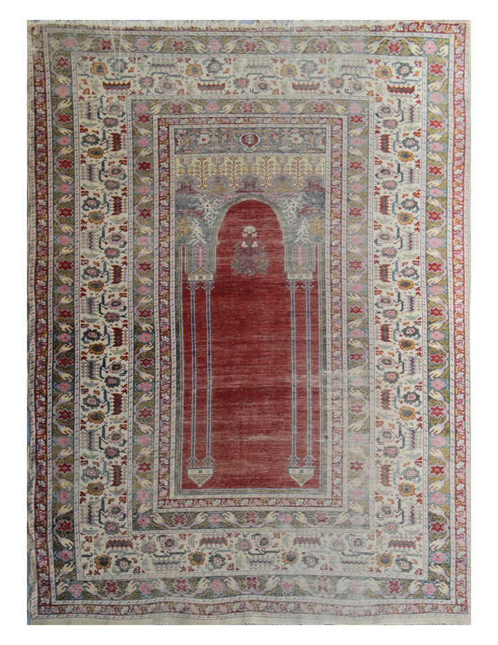 5'9" x 4'3" Rare Antique Ghiordes Western Anatolian Turkish Wool Prayer Rug with Mihrab Niche Design in Crimson Red, Ivory, Soft Pink, and Sage Green by Ariana Rugs West Hollywood