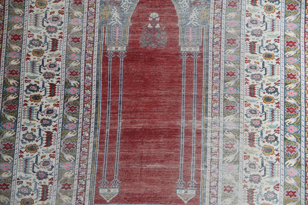 5'9" x 4'3" Rare Antique Ghiordes Western Anatolian Turkish Wool Prayer Rug with Mihrab Niche Design in Crimson Red, Ivory, Soft Pink, and Sage Green by Ariana Rugs West Hollywood