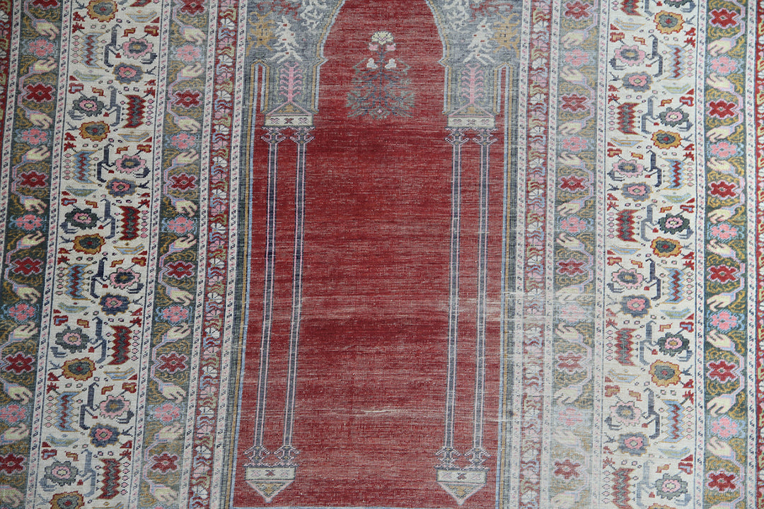 5'9" x 4'3" Rare Antique Ghiordes Western Anatolian Turkish Wool Prayer Rug with Mihrab Niche Design in Crimson Red, Ivory, Soft Pink, and Sage Green by Ariana Rugs West Hollywood