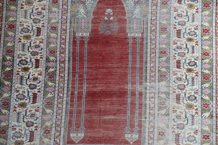 5'9" x 4'3" Rare Antique Ghiordes Western Anatolian Turkish Wool Prayer Rug with Mihrab Niche Design in Crimson Red, Ivory, Soft Pink, and Sage Green by Ariana Rugs West Hollywood