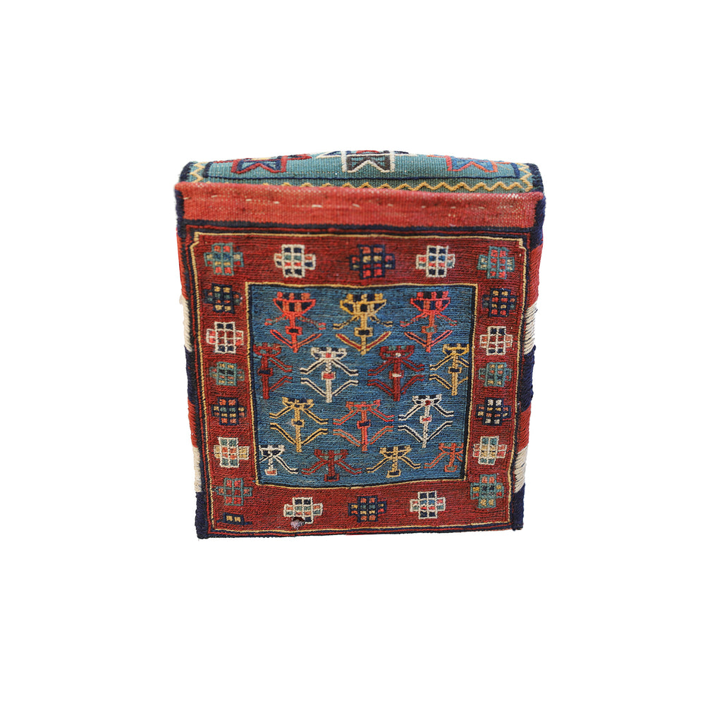 Small vintage Shahsavan Persian Soumak saddle bag with detailed blue and red geometric weaving.