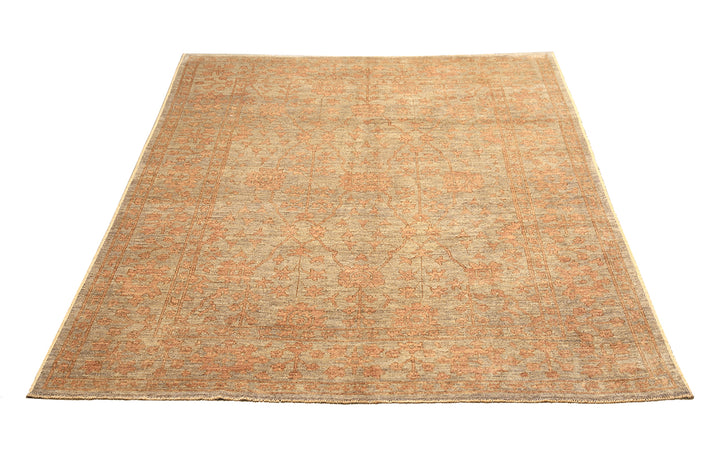 9x12 Soft washed floral Oushak hand-knotted luxury Afghan rug in organic wool with muted pastel tones, ethically woven by Hazara women artisans.