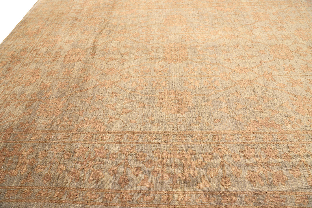 9x12 Soft washed floral Oushak hand-knotted luxury Afghan rug in organic wool with muted pastel tones, ethically woven by Hazara women artisans.