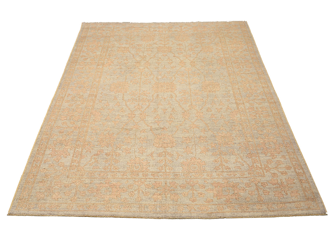 9x12 Soft washed floral Oushak hand-knotted luxury Afghan rug in organic wool with muted pastel tones, ethically woven by Hazara women artisans.