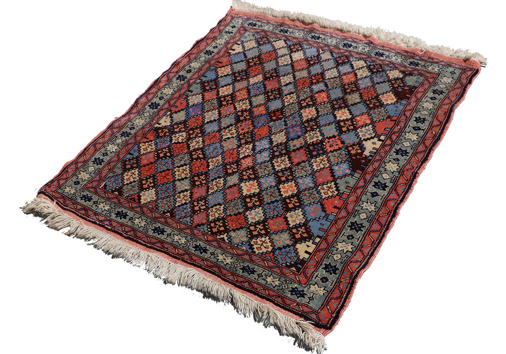 4x4 square Caucasian design wool rug with colorful geometric tribal motifs in 3 foot 10 inch by 3 foot 5 inch dimensions