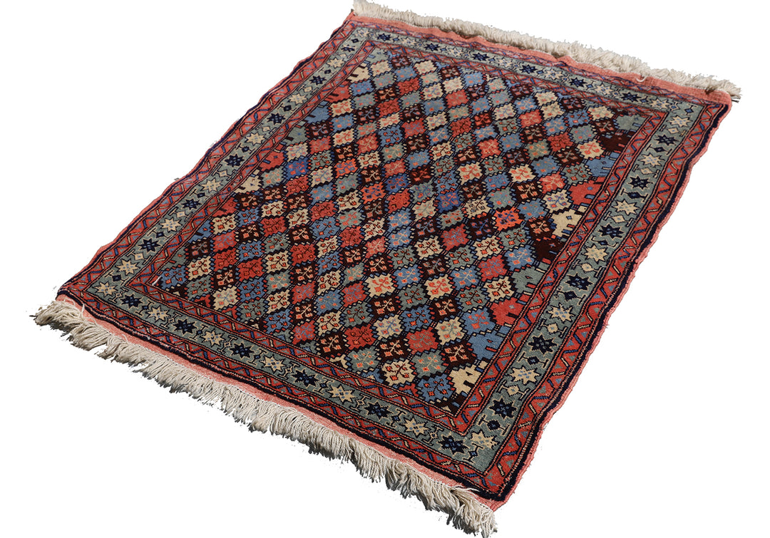 4x4 square Caucasian design wool rug with colorful geometric tribal motifs in 3 foot 10 inch by 3 foot 5 inch dimensions
