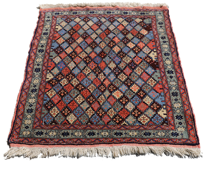 4x4 square Caucasian design wool rug with colorful geometric tribal motifs in 3 foot 10 inch by 3 foot 5 inch dimensions