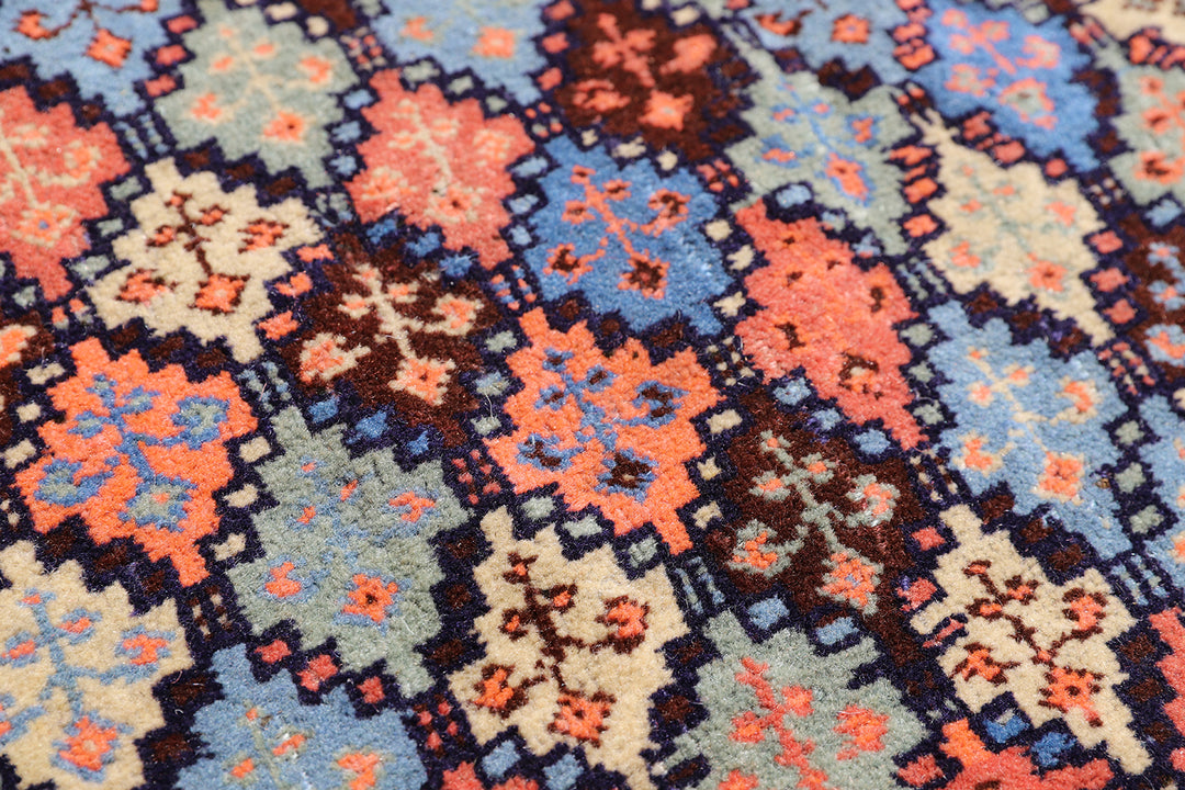 4x4 square Caucasian design wool rug with colorful geometric tribal motifs in 3 foot 10 inch by 3 foot 5 inch dimensions