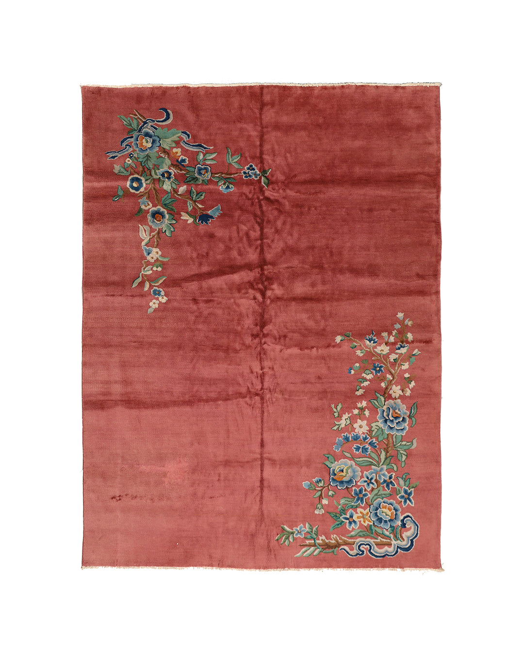 A 9x11 vintage Chinese Art Deco wool rug with a soft salmon pink background and sage green floral accents in the corners.