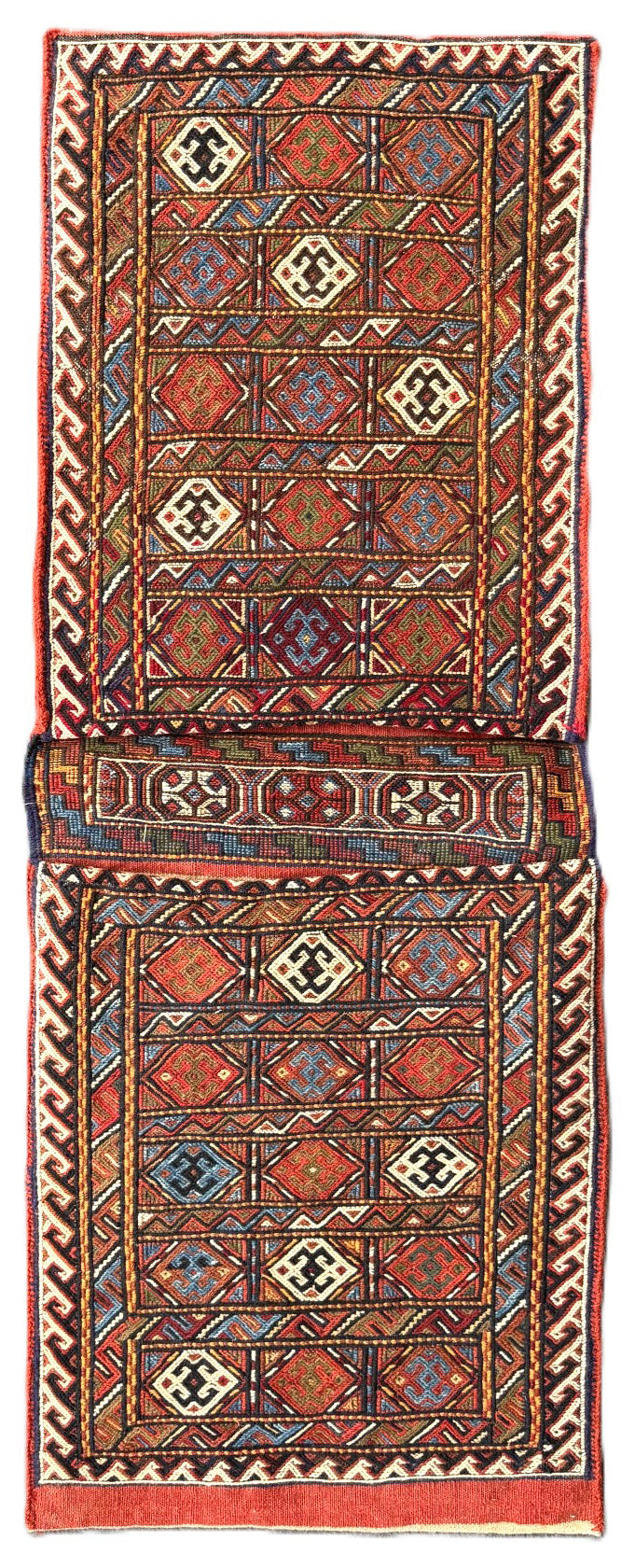 Pristine Persian tribal dowry saddle bag with intricate geometric wool weaving.