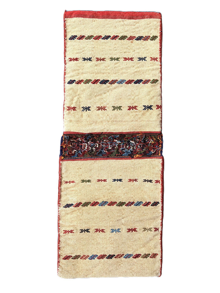 Pristine Persian tribal dowry saddle bag with intricate geometric wool weaving.