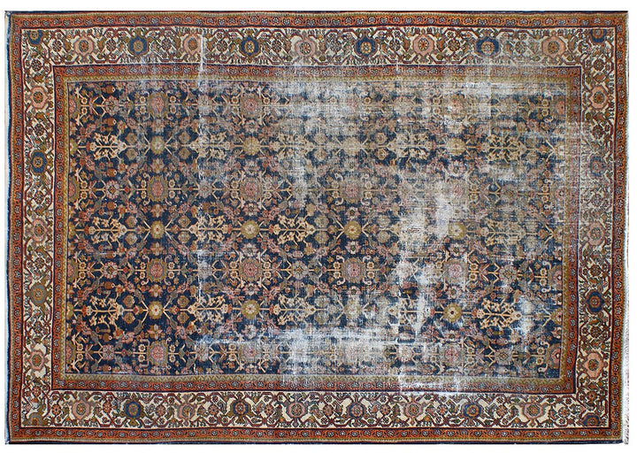 1920s vintage Persian Mahal rug 9x12 featuring a navy blue geometric pattern with terracotta, white, and gold accents.