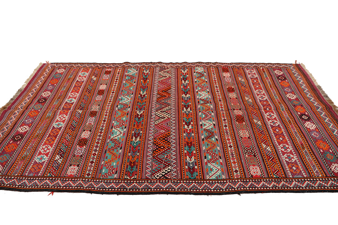 Fine vintage 5'2" x 9'9" Persian Soumak tribal kilim with ivory, red, and teal vegetable dyes, curated by Ariana Rugs in West Hollywood.