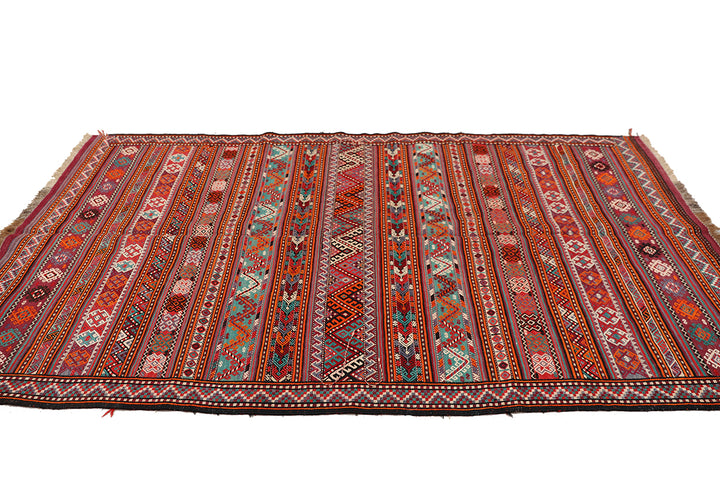 Fine vintage 5'2" x 9'9" Persian Soumak tribal kilim with ivory, red, and teal vegetable dyes, curated by Ariana Rugs in West Hollywood.