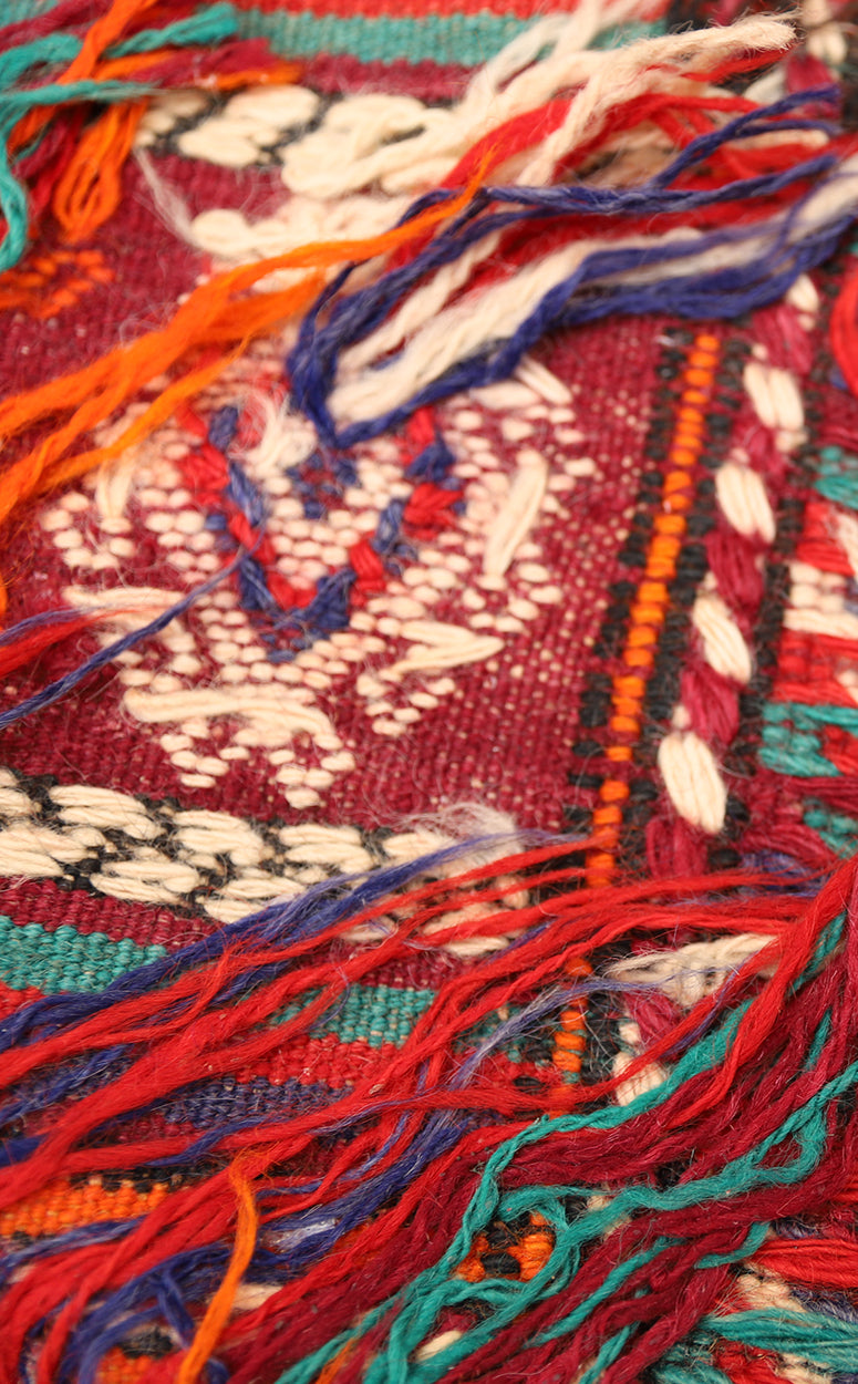Fine vintage 5'2" x 9'9" Persian Soumak tribal kilim with ivory, red, and teal vegetable dyes, curated by Ariana Rugs in West Hollywood.