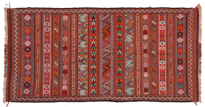 Fine vintage 5'2" x 9'9" Persian Soumak tribal kilim with ivory, red, and teal vegetable dyes, curated by Ariana Rugs in West Hollywood.