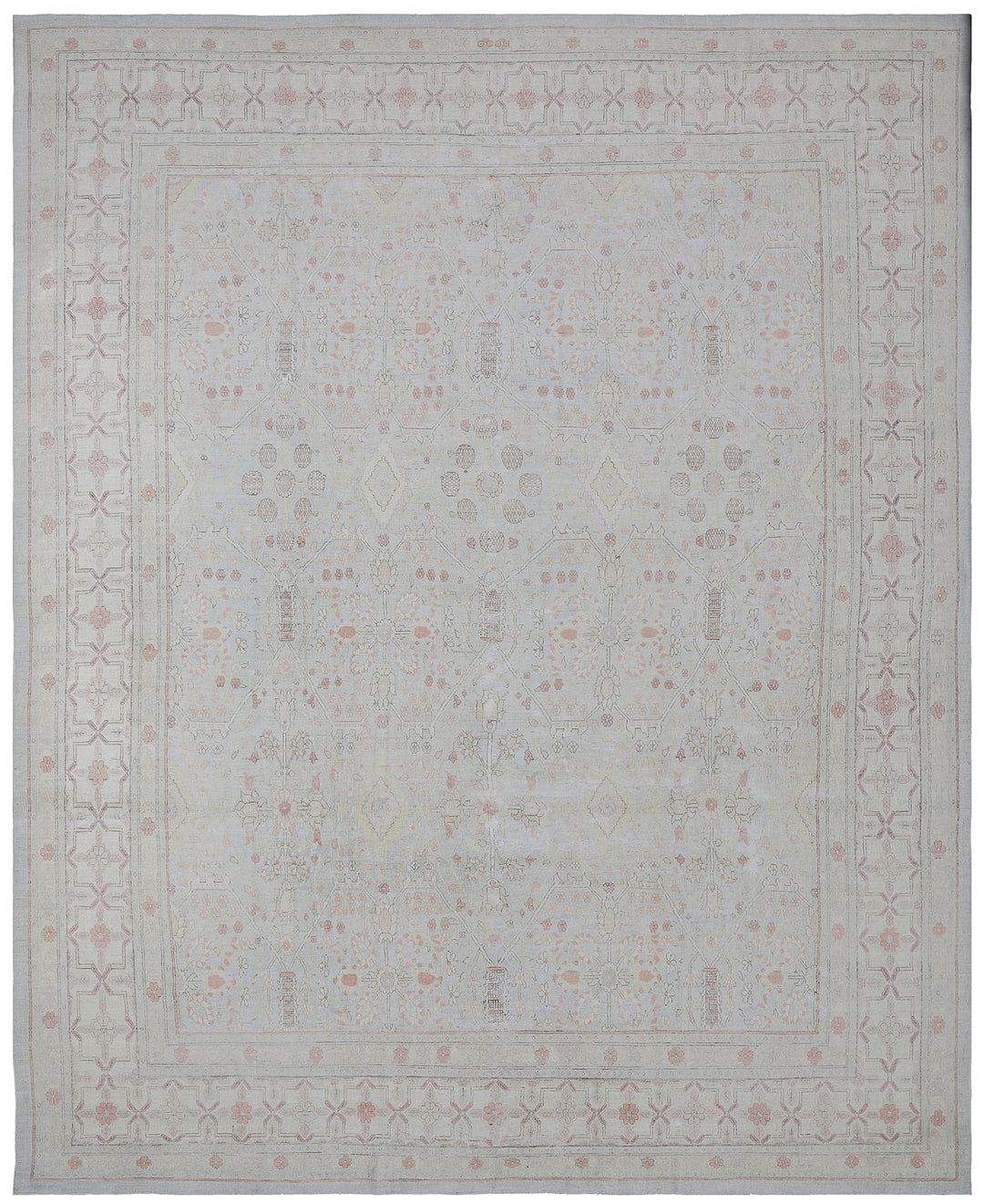 A fine wool and silk rug with an icy blue, pink, and ivory color scheme and a geometric Tabriz design.