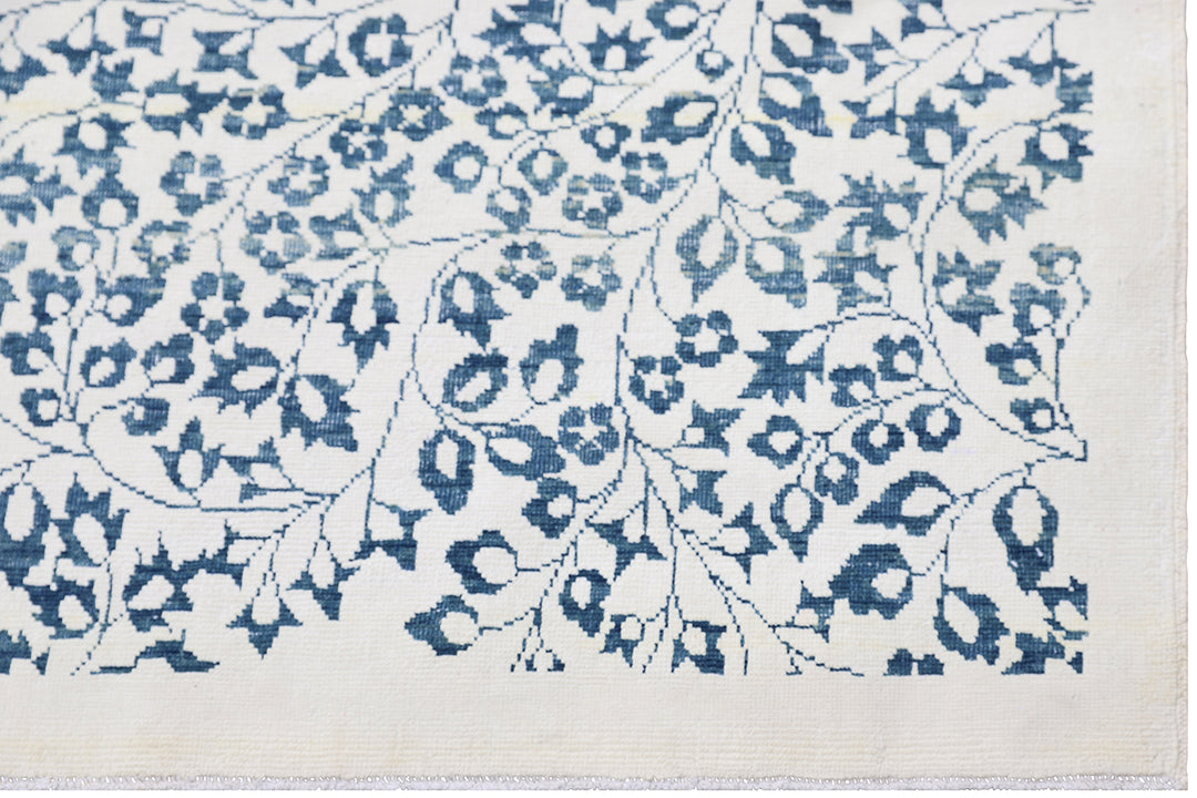 Unique 10x14 Ariana modern Millefleur French floral design rug in wool and cotton from a trusted dealer with over 45 years of experience.
