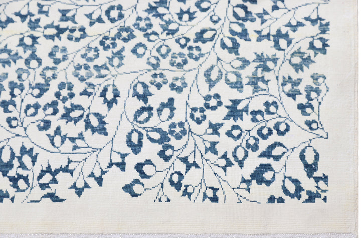 Unique 10x14 Ariana modern Millefleur French floral design rug in wool and cotton from a trusted dealer with over 45 years of experience.