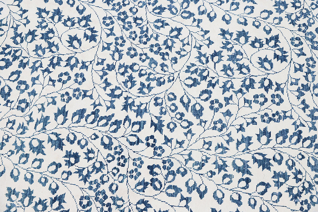 Unique 10x14 Ariana modern Millefleur French floral design rug in wool and cotton from a trusted dealer with over 45 years of experience.