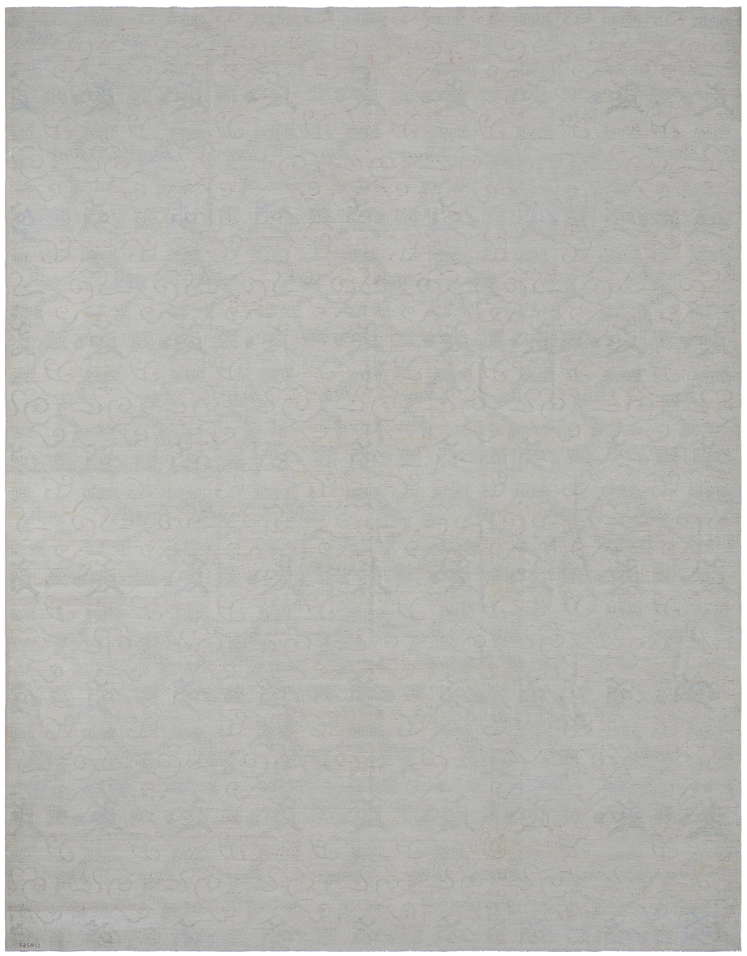 A modern ivory pale blue rug with a subtle texture, rectangular in shape.