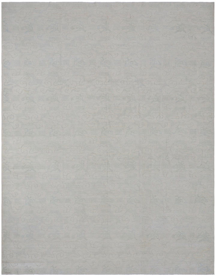 A modern ivory pale blue rug with a subtle texture, rectangular in shape.