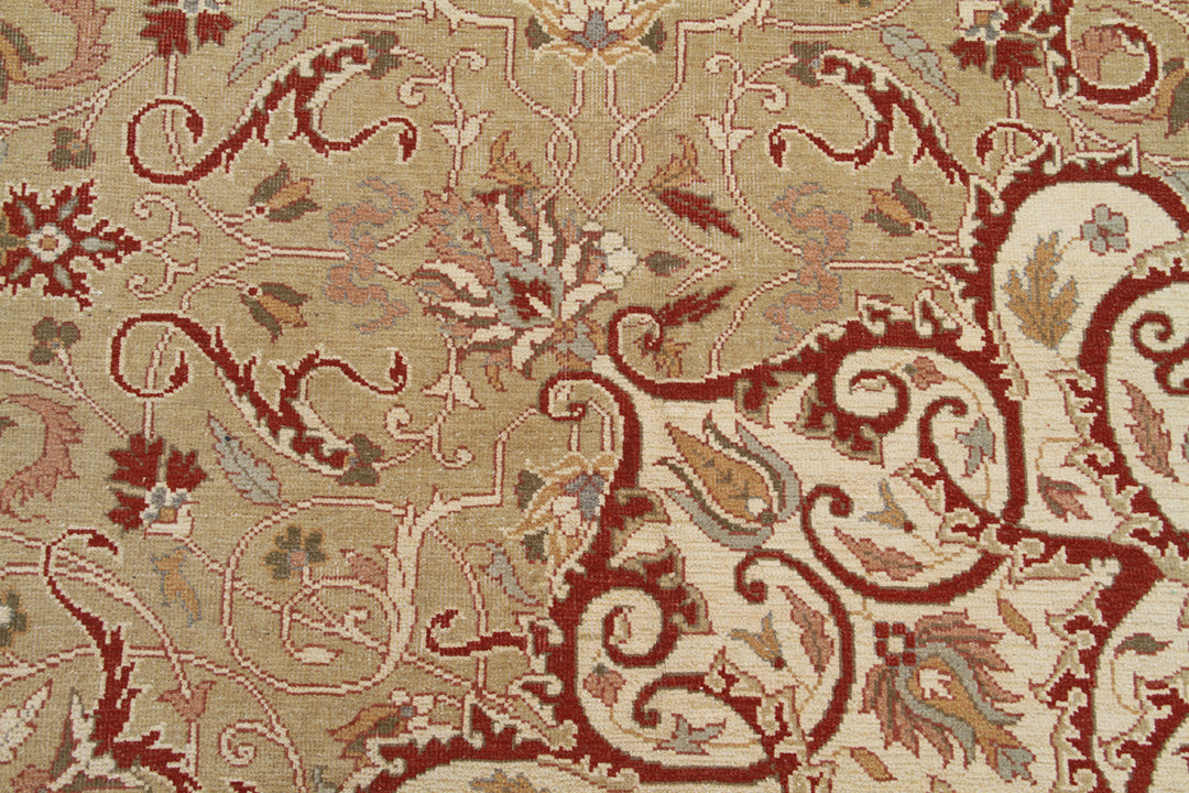 18.04 x 12.02 Grand palace size Egyptian hand-knotted area rug featuring an intricate floral motif in deep green and terracotta.
