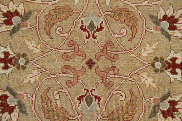 18.04 x 12.02 Grand palace size Egyptian hand-knotted area rug featuring an intricate floral motif in deep green and terracotta.
