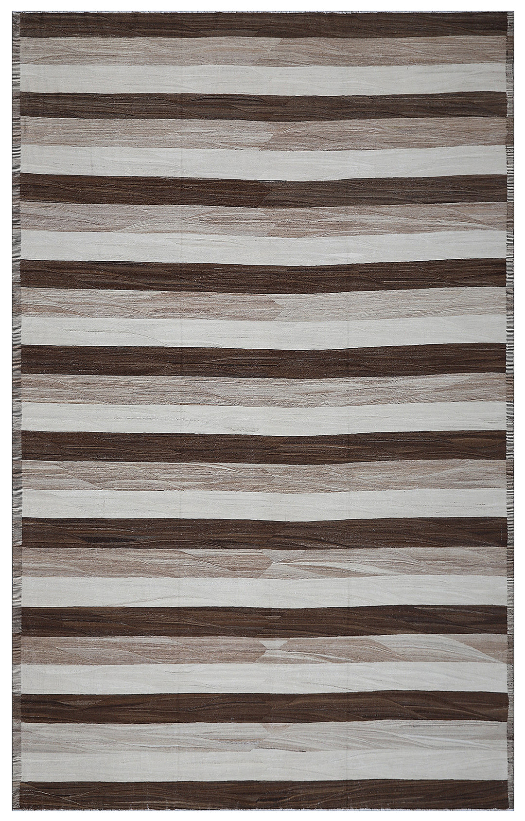 A large rectangular rug with a striped pattern featuring shades of brown and ivory, with a textured and handcrafted appearance.